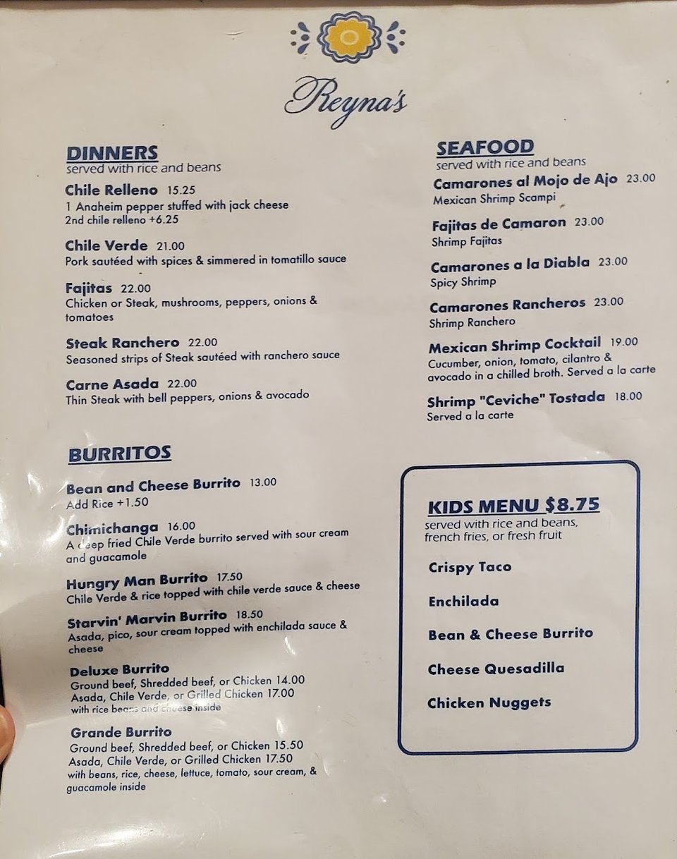 Printed menu with burritos and enchiladas.